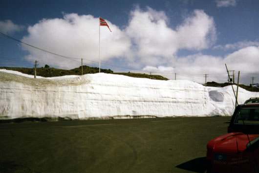 Test site in Norway where snow pack that has not melted totally by the end of June. Snow layering is visible and in some cases there is multi-year accumulations.
